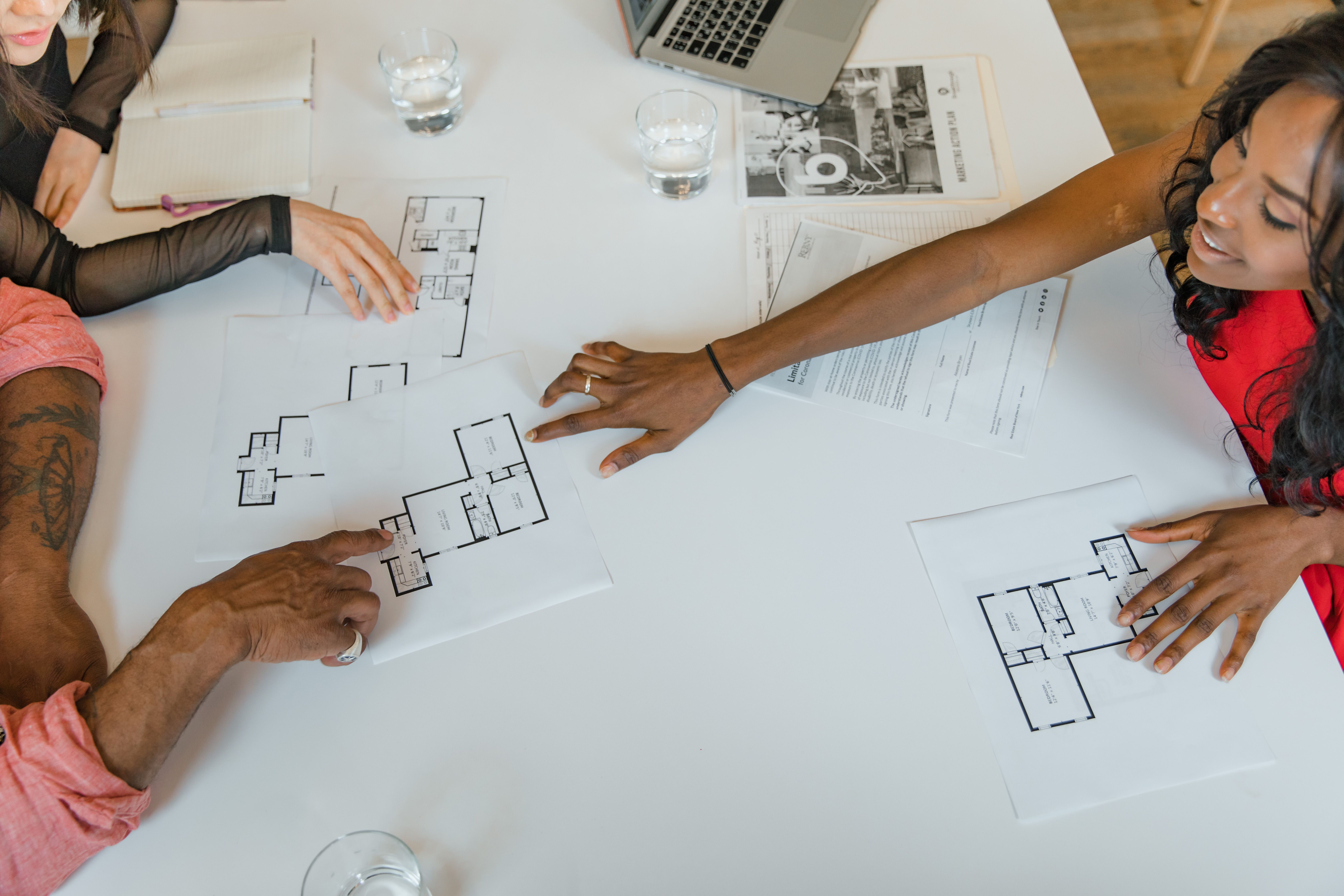 Small business team collaborating around a table during a planning meeting